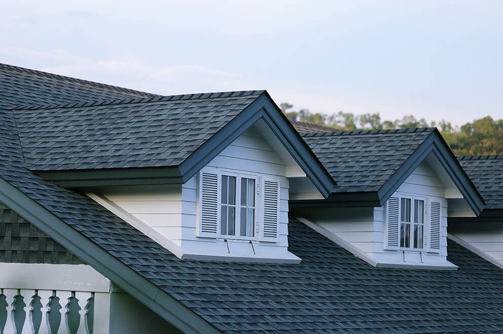 roof shingles on a home by our residential roofing services