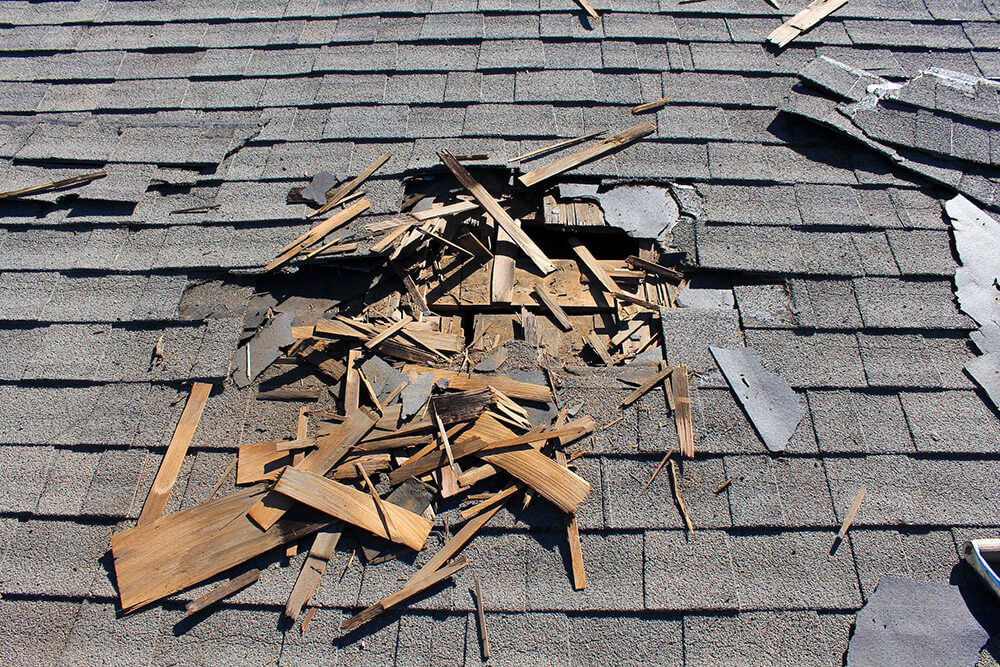 view of a damaged roof