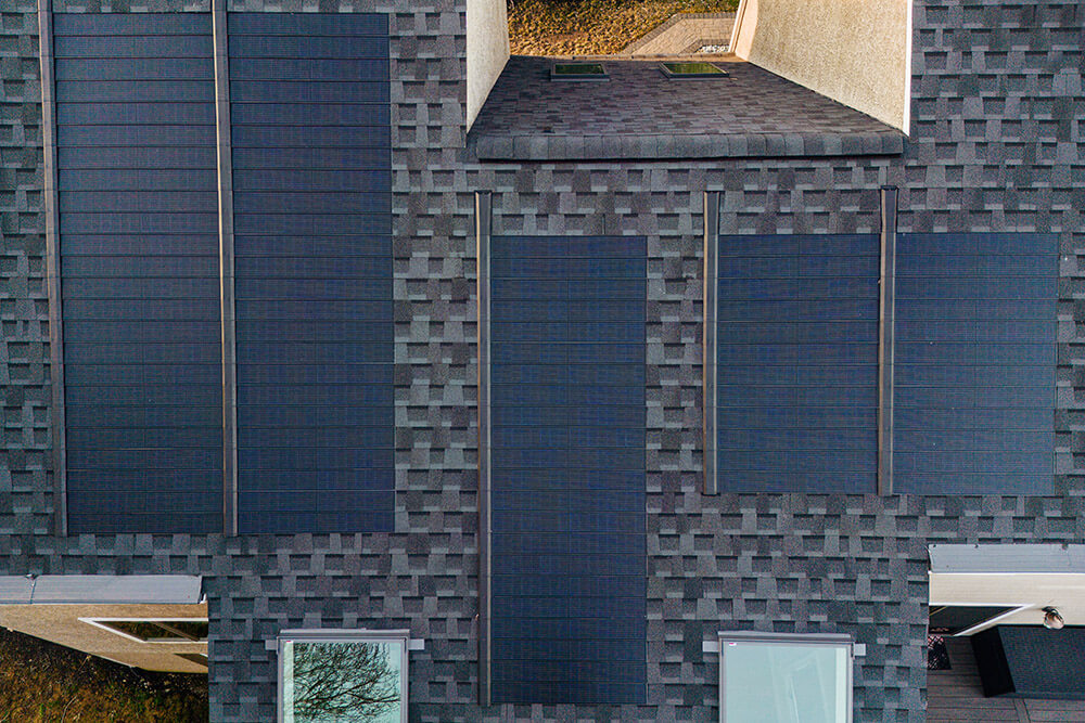 aerial view of solar shingles on a house